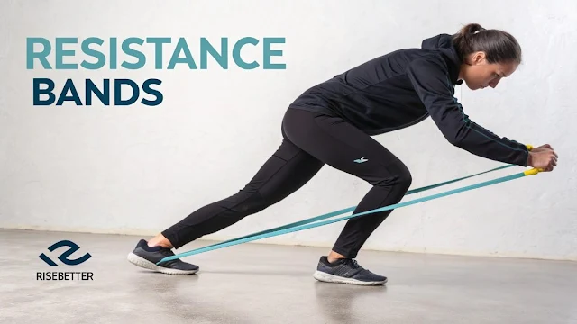a lady doing workout with a resistance band