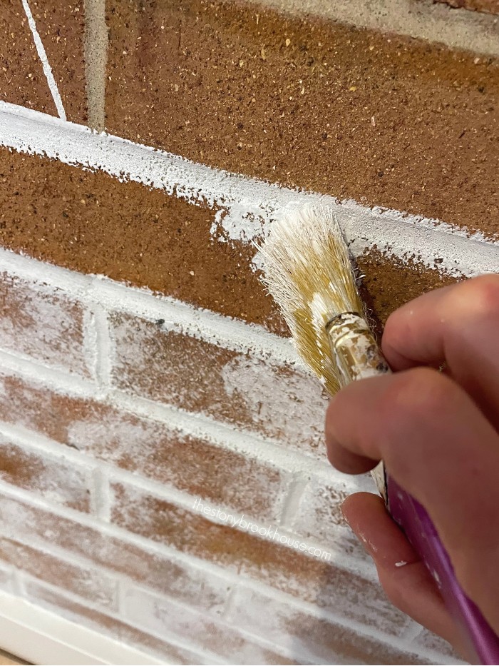 Pouncing paint onto the brick-Faux German Smear