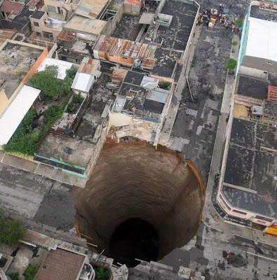 Giant Sinkholes on Giant Sinkholes And Road Collapses 01 Jpg