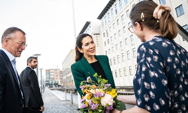 Crown Princess Mary wore a new tuxedo collar green blazer  by Zara, and multicolour wide-leg wool trousers by Celine