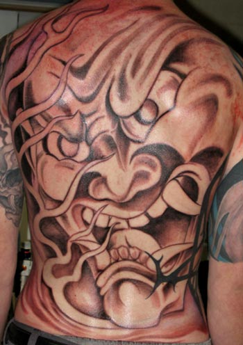 are often frightened with the word Yakuza. back style yakuza tattoo