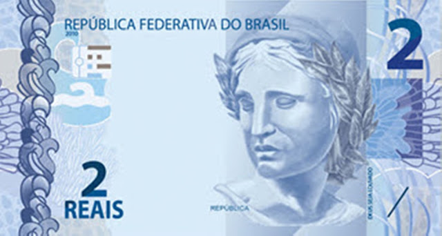 A foto mostra uma cédula de 2 reais que representa o baixos salários do trabalhador do Brasil, recebe um salario de fome.
