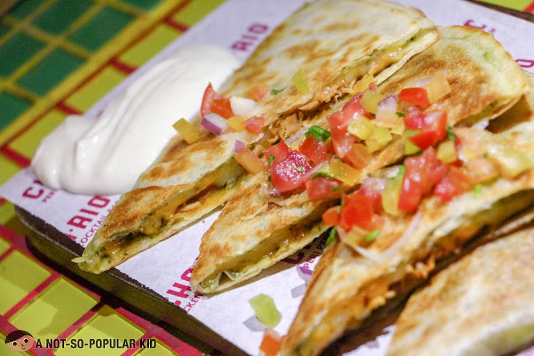 Chichario's quesadilla with pesto sauce