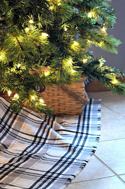 Add the perfect holiday farmhouse touch to your home with this no sew plaid tree skirt.