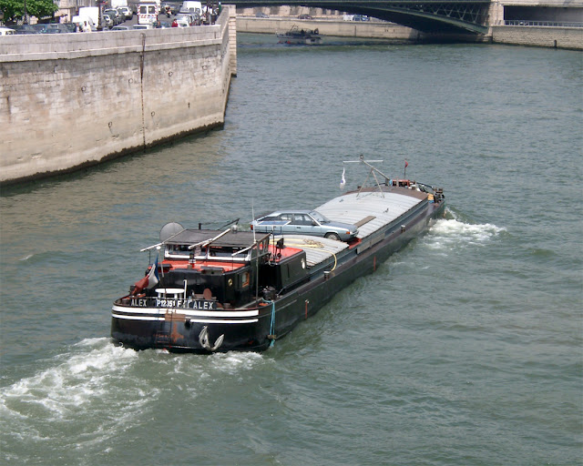 Car on the barge Alex P12351F, River Seine, Paris