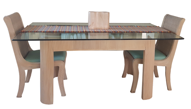 A heavy glass-topped dining table with bamboo legs, and chairs. A very "Floridian" type of furniture.