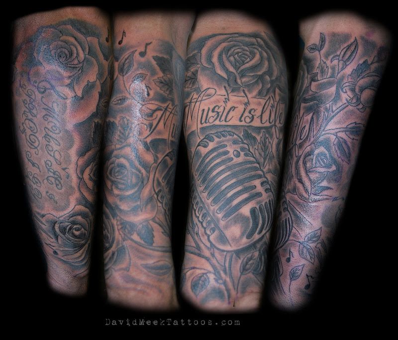 Black and Grey Microphone and Roses half sleeve Tattoo by David Meek  title=