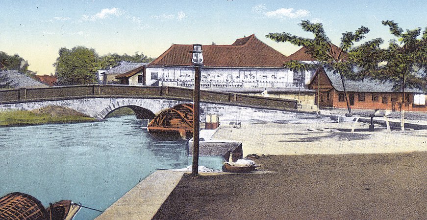 River landing at Malolos along the Tampoy River with the Tanchanco House beyond the 1810 stone bridge