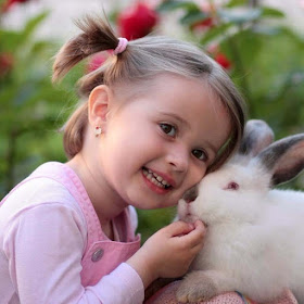 cuty-babygirl-kissing-white-rabbit-walls