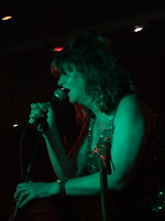 Gina Birch on-stage at Barden's Boudoir; photo by Val Phoenix