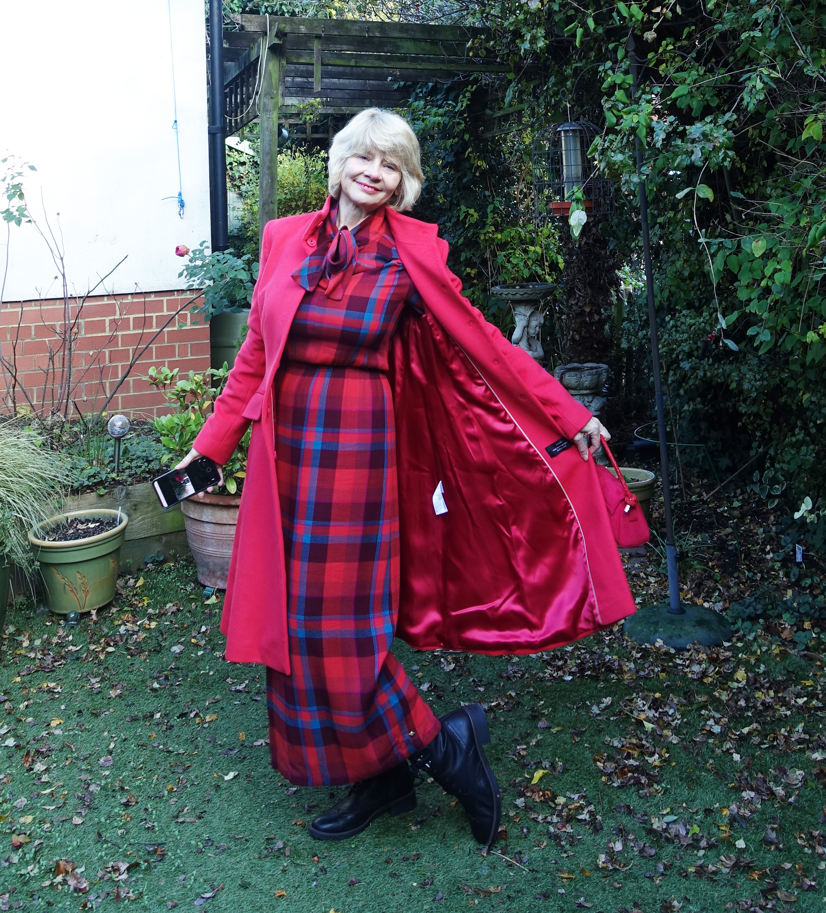 Poppy red fitted coat, a thrifted find, worn by Is This Mutton blogger Gail Hanlon