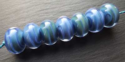 Lampwork glass beads by Laura Sparling, made with CiM 'Class M Planet'