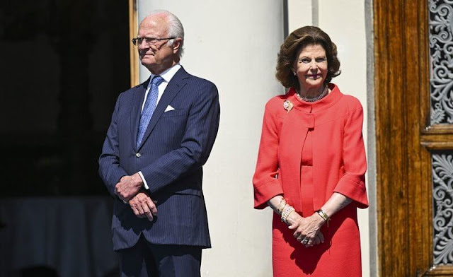 Queen Silvia wore a red jacket and red skirt, Chanel pumps, pearls necklace and diamond earrings