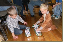 The boys playing with their Hess trucks from Santa 12/19/2010