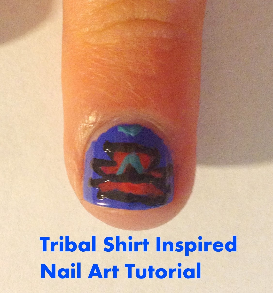 http://apolishedbookworm.blogspot.com/2014/07/tribal-shirt-inspired-nail-art-tutorial.html