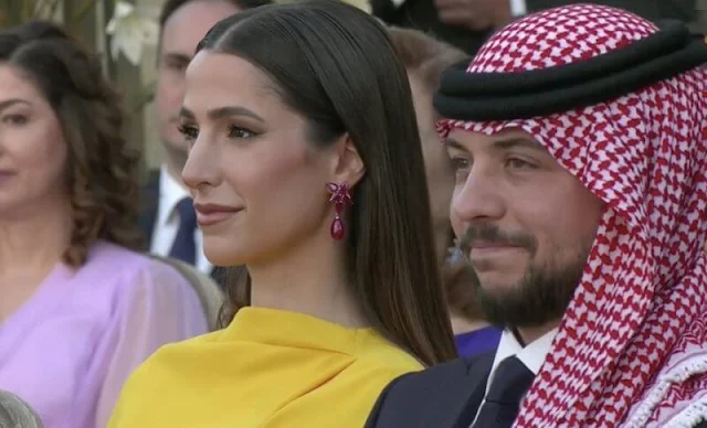 Queen Rania in Christian Dior gown. Princess Salma in Andrew Gn dress. Rajwa in Roksanda yellow dress. Iman in Chaumet tiara