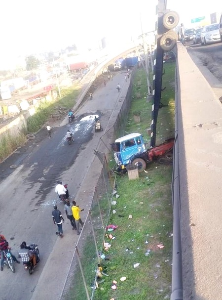 Tragic! See How a Trailer Fell Off the Apapa-Ijora Bridge in Lagos State (Photos)