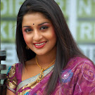 Meera Jasmine in Transparent Saree  Cute Photos