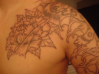 Flower Tattoo Design on Upper Side Man