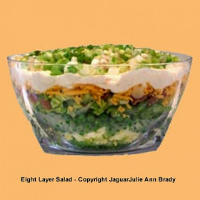 eight layer salad in acrylic bowl