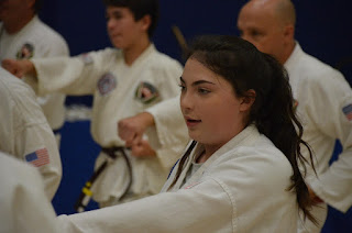 Teaching academic achievement through martial arts Taekwondo training