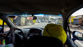 Riding a shared taxi in Accra. This is how it looks like.