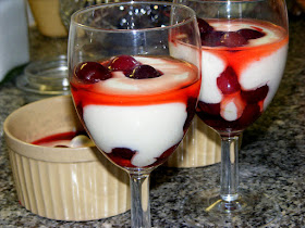 Fromage blanc battu and homegrown cherries macerated in kirsch.  Indre et Loire, France. Photographed by Susan Walter. Tour the Loire Valley with a classic car and a private guide.
