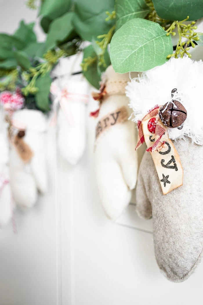 mitten ornaments hanging as garland