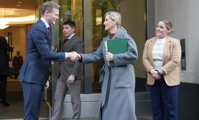 The Countess of Wessex wore a wool blend coat by Lanvin, and red wool blend lace flared knit dress by Azzedine Alaia