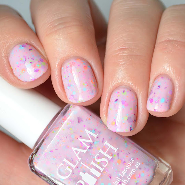 pink nail polish with glitter swatch