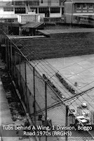 Sanitary tubs, exercise yard, No.1 Division, Boggo Road, Brisbane, 1970s.