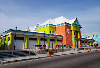 Brightly colored straw market building