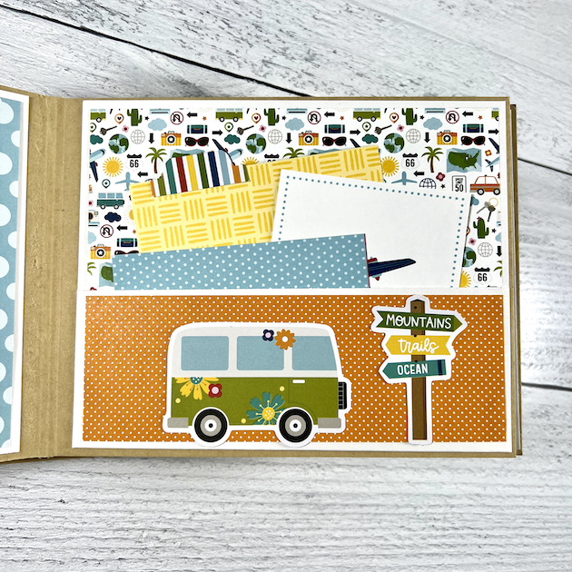 Travel scrapbook album page with VW Bus and a pocket for vacation photos