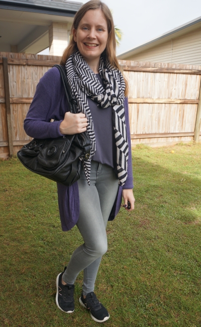 moncohrome grey tee and skinny jeans sneaker outfit with black white scarf and button bag and purple cardigan