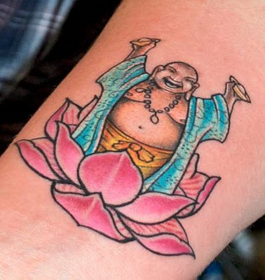 Budha tattoo on upper lotus flower tattoos for women