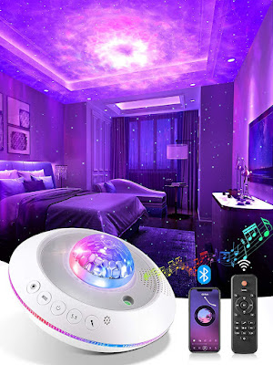 star projector shown in bedroom