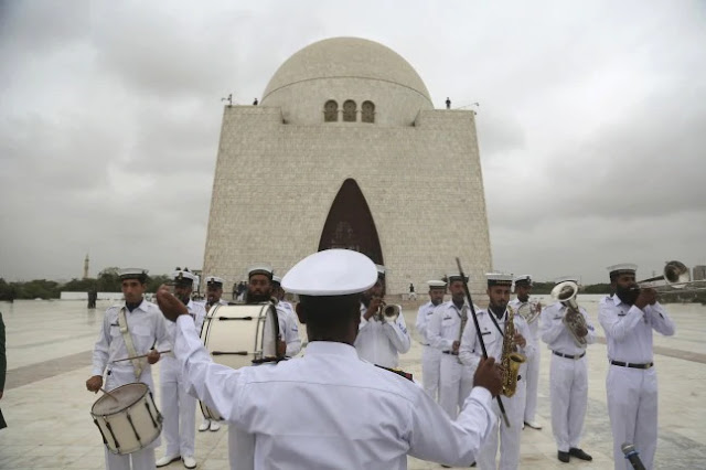 Soldiers from the Pakistan Navy played the national anthem at the mausoleum of Muhammad Ali Jinnah.