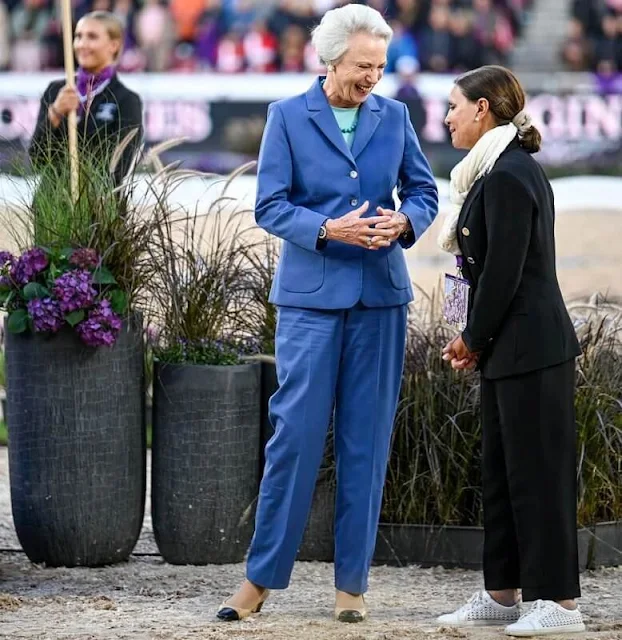 Princess Benedikte wore a navy blue pant suit blazer at the Stuttari Ask stadium in Herning