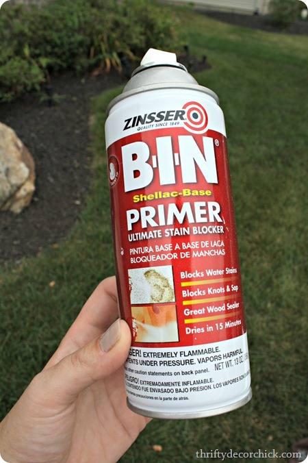 spray primer over dark wood
