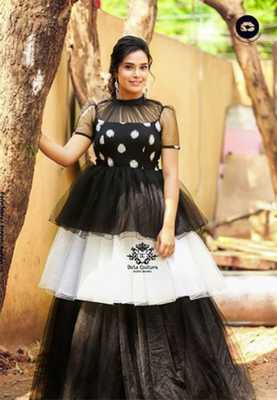 Hari Teja hot images in black transparent dress 