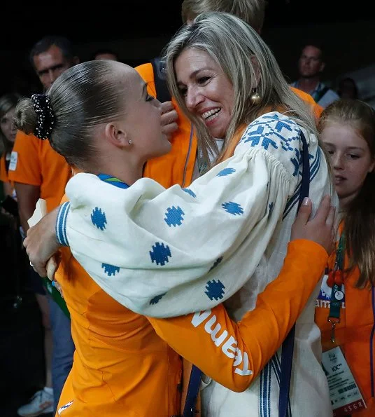 Maxima wore March 11 Poppy Flower Midi Dress. Queen Maxima, Princesss Catharina-Amalia, Princess Ariane, Princess Alexia at Rio Olympics Artistic Gymnastics events, Sanne Wevers