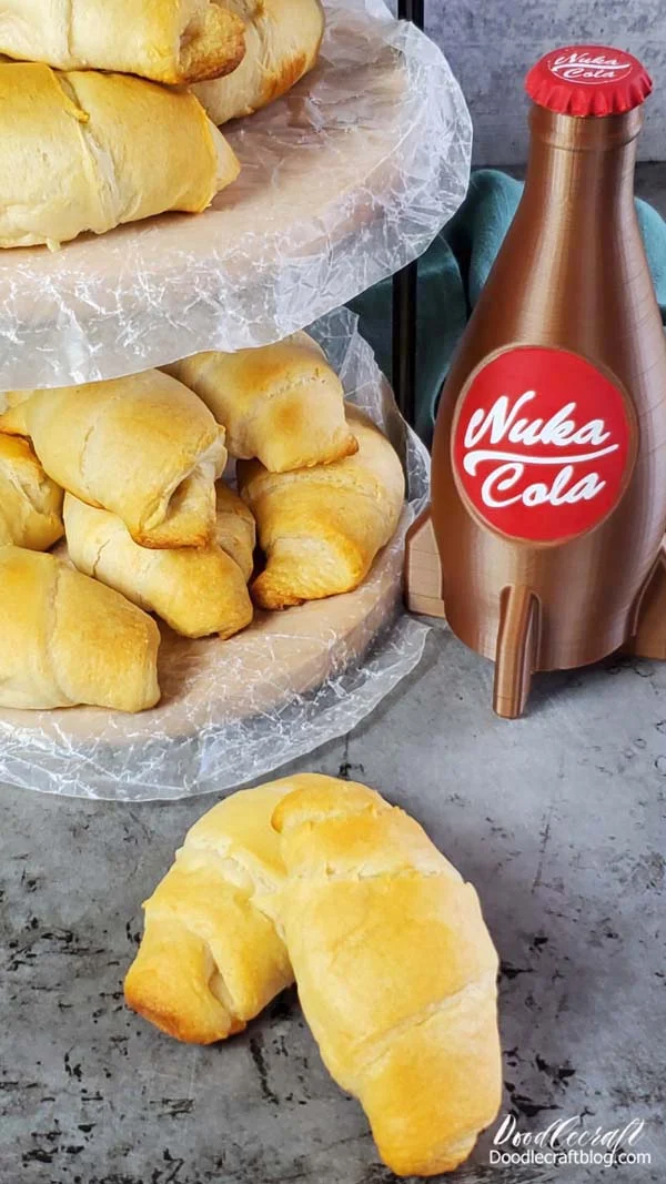 Deathclaw Wellingtons go great with a bottle of Nuka Cola and some Bloodleaf Aioli dipping sauce.   Great party food appetizer for your TV series watch party, total Fallout geek party or just to make the kids happy!