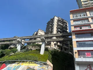 Metro entering into the building like Liziba station