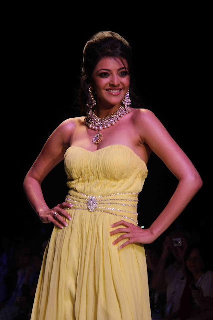 South Indian Hot Actress Kajal Agarwal Stills in Yellow Dress