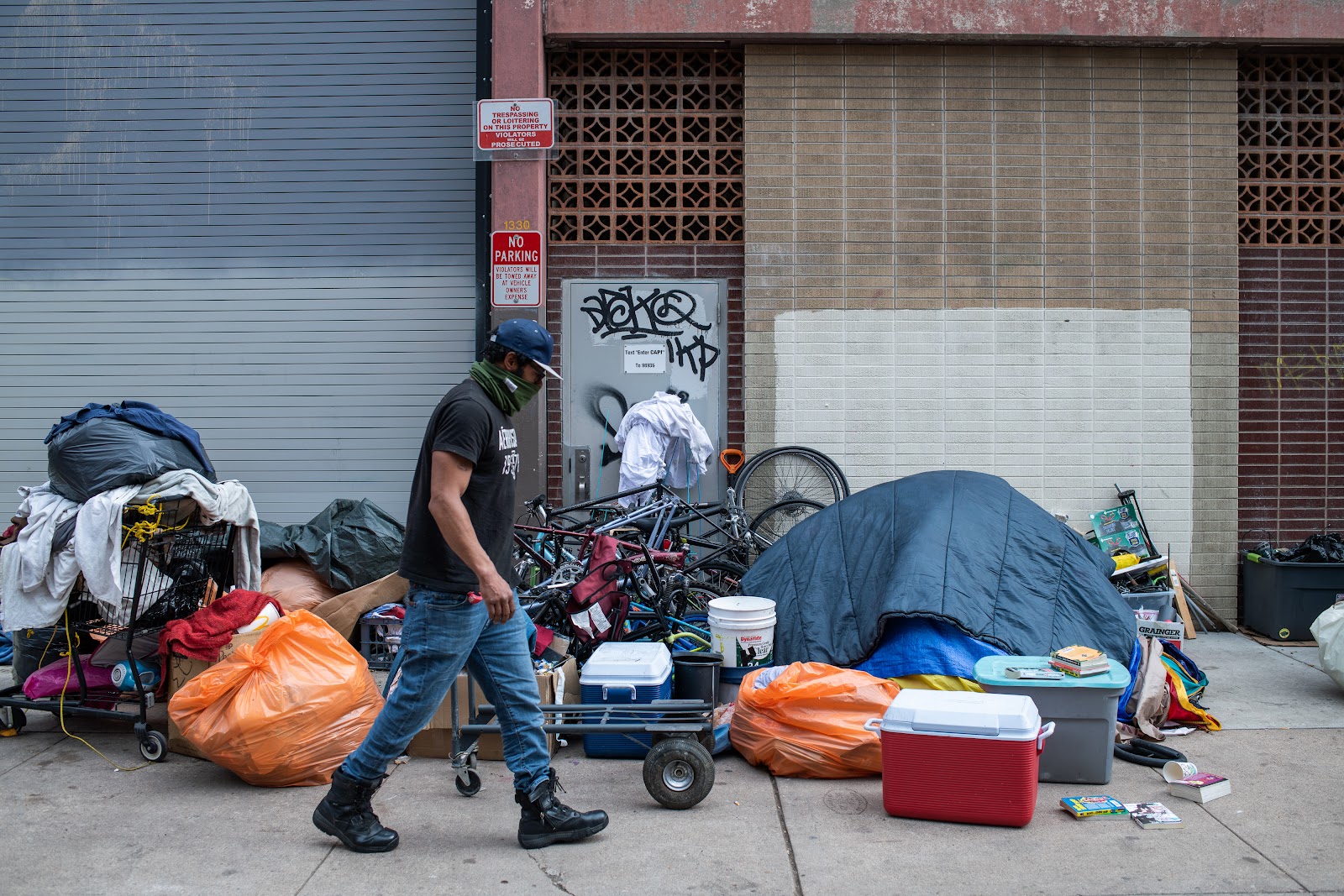 Image of homeless camp on sidewalk