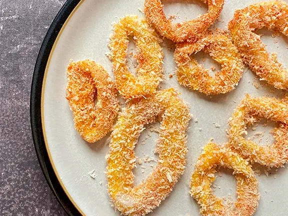 Calamari coated in panko crumbs.