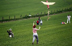 People fly their kites