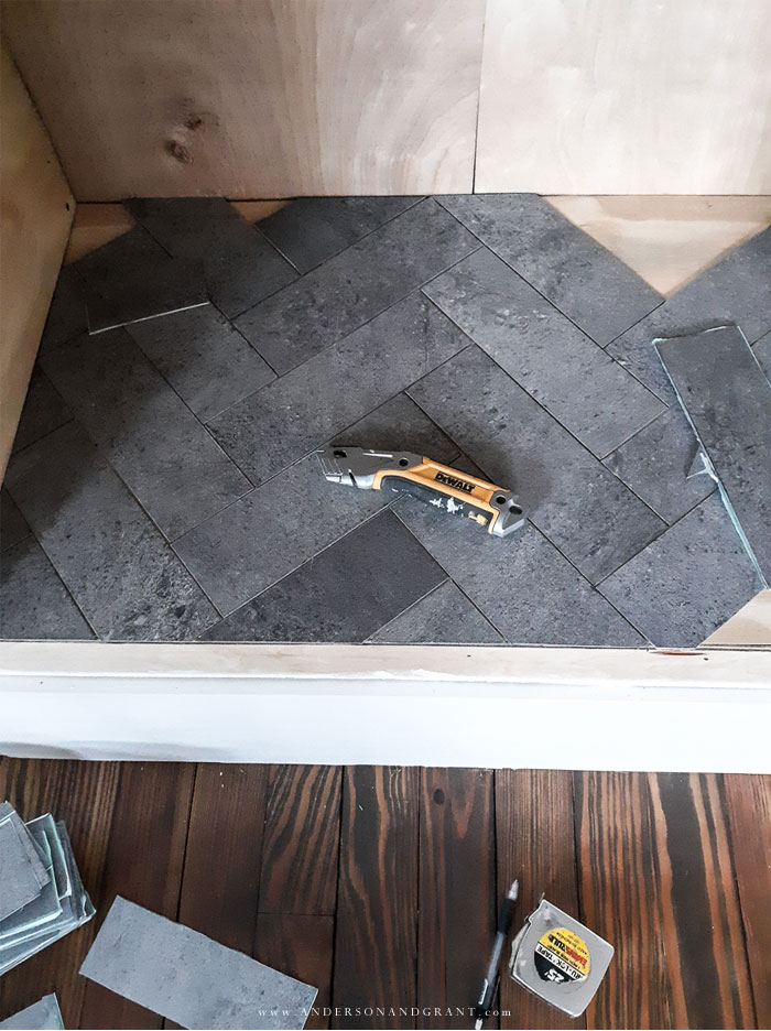 Vinyl tile in herringbone patter