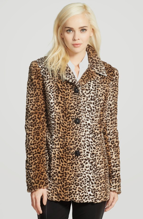 An elegant coat styled with notch lapels and engraved front buttons is crafted from lustrous faux fur and patterned in a leopard print with an allover ombré fade.