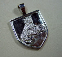 Custom made 10 karat white gold animal pendant made by Payne's Custom Jewelry